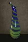 A large Murano style blue and green striped art glass vase. Signed to the base. H.74 W.21 D.15cm.