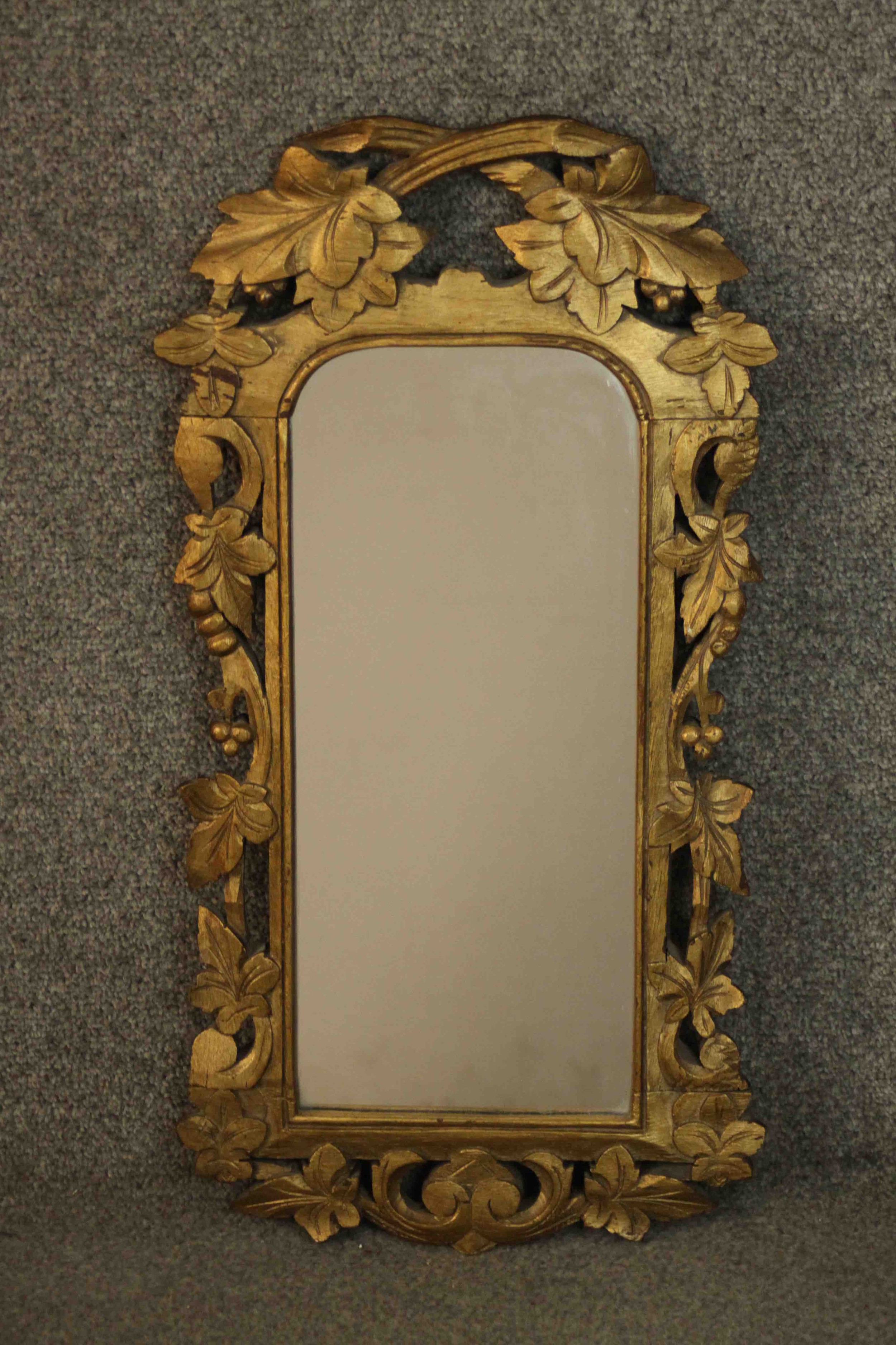 An 18th century carved giltwood framed mirror of small proportions, carved with scrolling vines, - Image 5 of 11