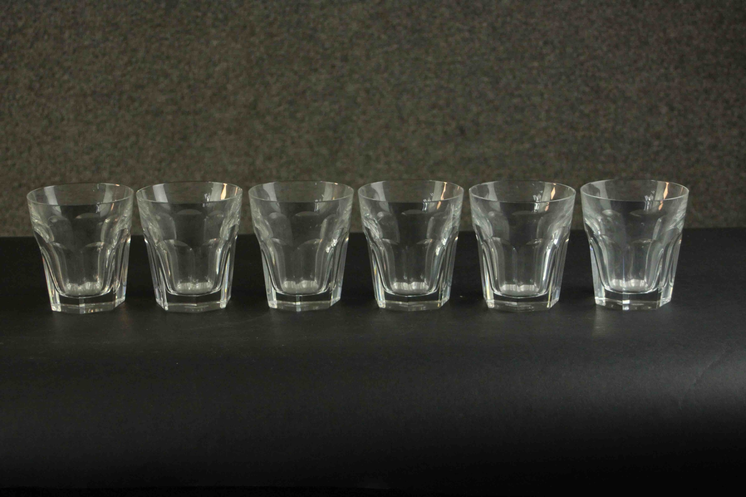 A set of six hand cut Baccarat crystal Harcourt tumblers, etched mark to base. H.9.5 Dia.9cm.