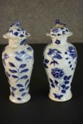 Two Chinese lidded blue and white hand painted porcelain jars. Decorated with flowers and birds