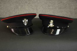 Two military caps, Yorkshire regiment. H.13 W.25 D.27cm. (size 57cm)