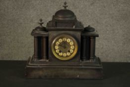 A Victorian black slate classical style architectural design mantle clock, white enamel and gilt