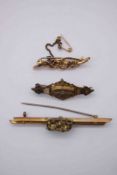 Three 19th century antique brooches. A gold nugget bar brooch, stamped 9ct, a Victorian mourning