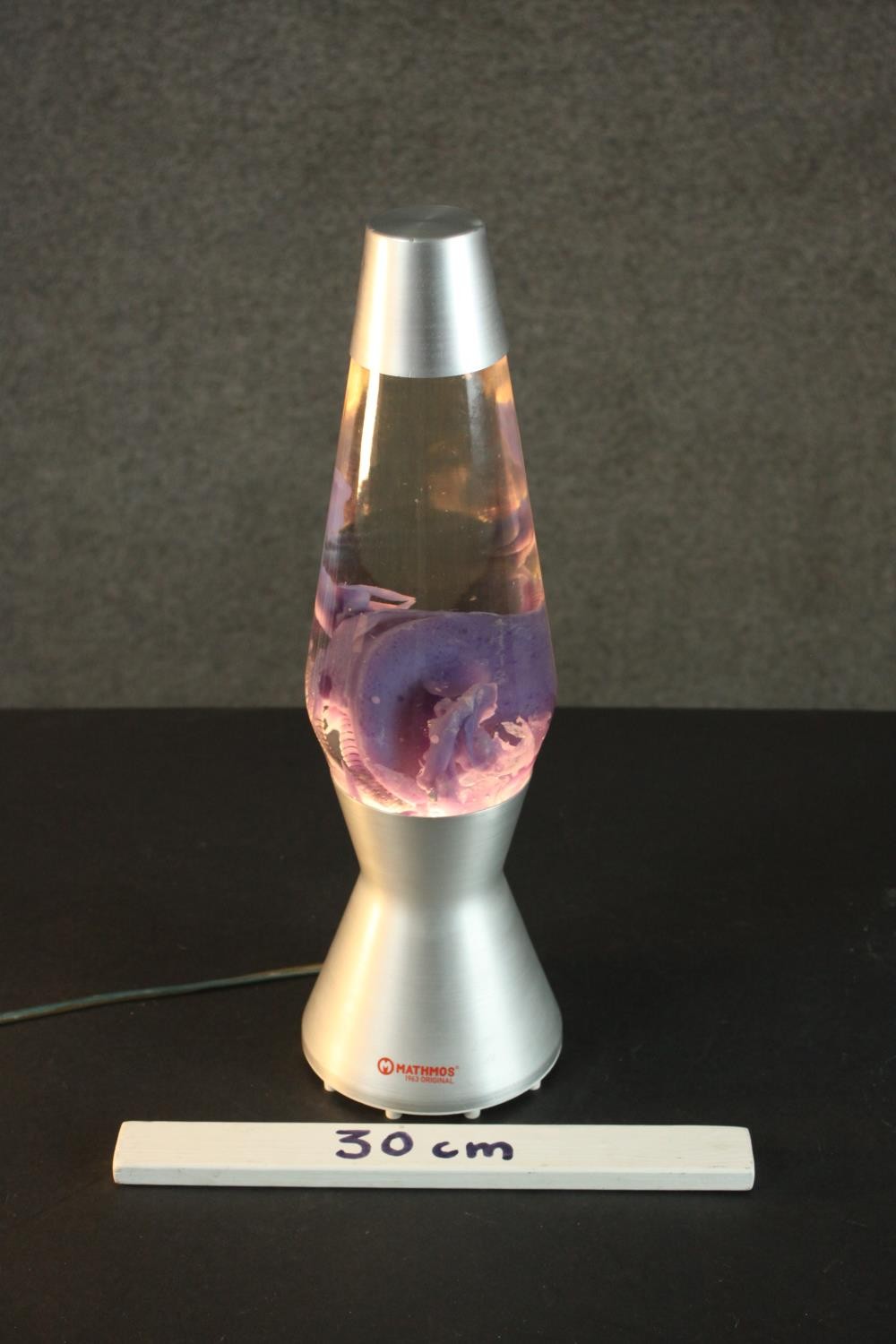 A 1960s style Mathmos lava lamp, the oil contained inside of purple hue, bearing label 'Mathmos, - Image 2 of 4