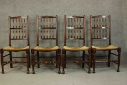A set of four Lancashire stained beech country dining chairs, with a splindle back, over a rush