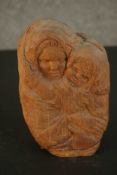 Tacita Fontana, a wooden carving of mother and child, signed to the back and label verso. H.20 W.