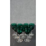 A collection of eight Victorian Bristol Green and clear glass stemmed glasses. H.13 Diam.6cm