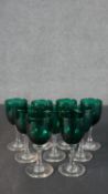 A collection of eight Victorian Bristol Green and clear glass stemmed glasses. H.13 Diam.6cm