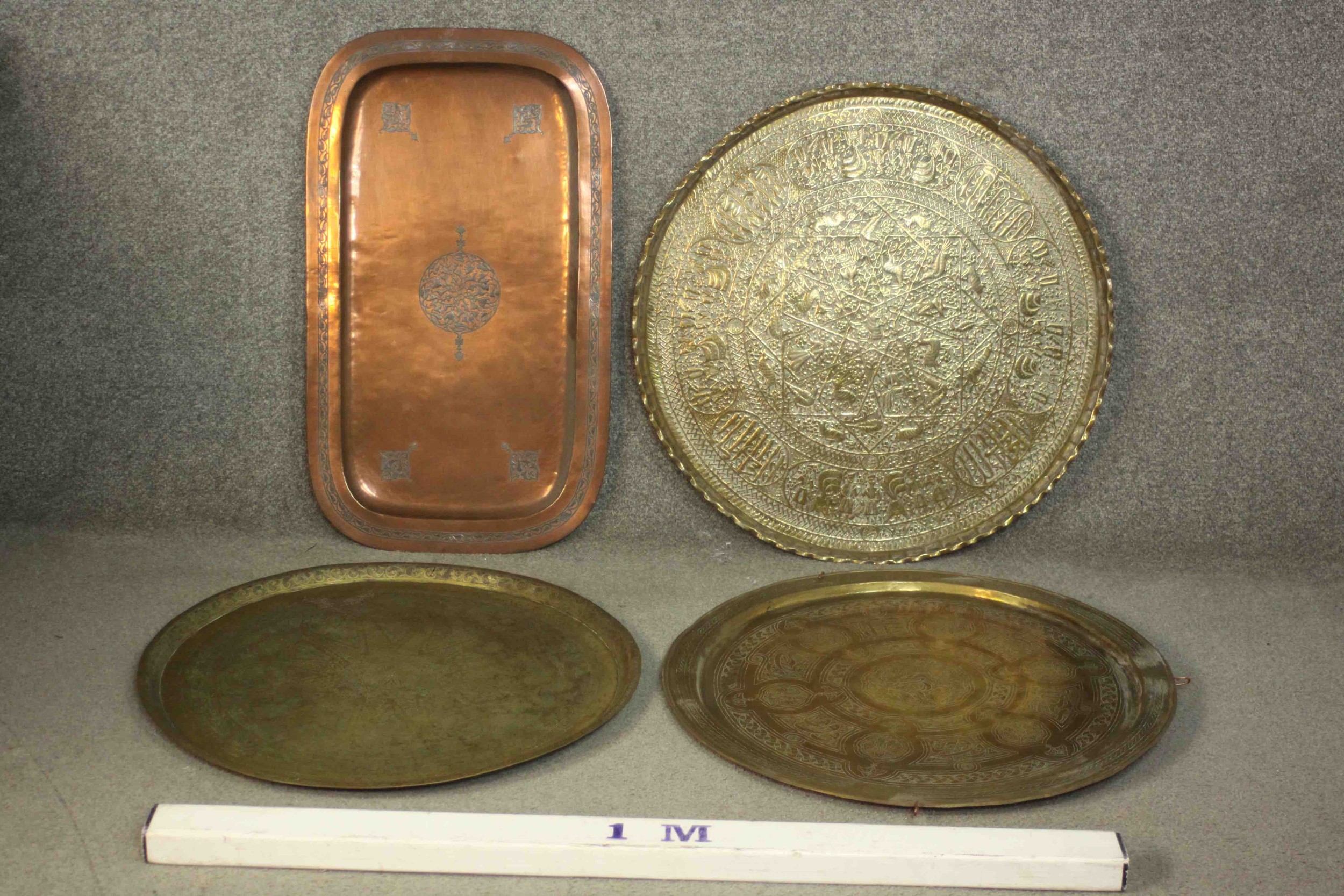 A collection of four 19th century Oriental brass and copper trays. Three circular trays - Image 2 of 10
