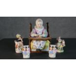 A collection of 19th century Staffordshire pottery figures. A pair of flat back figures of a
