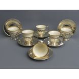 A set of six Sterling silver and Lenox porcelain cabinet cups and saucers. Silver weight 284