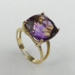 9ct gold Amethyst single stone ring, 3.4 grams. Size M, 12 mm wide. UK Postage £12.