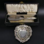 Cased silver hairbrush, Birmingham 1936 and a silver heart form pin tray. Brush 17.7 cm. UK