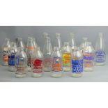 17 vintage milk bottles advertising various products and from different dairies. Collection only.