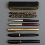 Two vintage pens viz a Burnham 55 14ct nib and a Swan Mabie Todd 14ct nib, two Parker 51 pens...