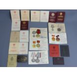Russian Medals and passports dating from World War II onwards. UK Postage £12.