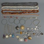 A collection of silver and other jewellery, including coral beads, silver gate bracelet, brooches