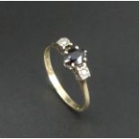 9ct Sapphire & Diamond three stone ring, 1.3 grams. Size M 1/2, 6 mm wide. UK Postage £12.