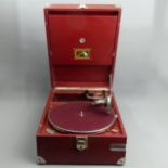 HMV maroon cased table top portable wind-up gramophone with an HMV no.4 pick-up. UK Postage £30.
