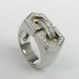 Audemars Piguet No.A4652 18ct white gold and Diamond ring, 15.7 grams. Size M 1/2, 10.6 mm. UK