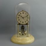 Good quality Anniversary clock under a glass dome on a white onyx base. 32 x 18 cm. Collection only.