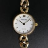 Ladies 9ct gold Accurist quartz watch and strap, 15 grams. 20 mm dia. UK Postage £12.