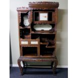 Late 19th century Oriental carved hardwood display cabinet. Collection only