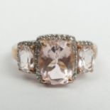 9ct rose gold pale pink stone and diamond set ring, 4.2 grams. Size T, 11.4 mm wide. UK Postage £12.