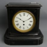Victorian black cased mantle clock, with key and pendulum. 26 x 27 x 16 cm. UK Postage £16.