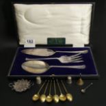 A cased silver plated serving set, silver thimbles, six silver coffee bean spoons, perfume bottle