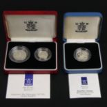 The Royal Mint 1990 silver five pence two-coin set and a 1991 silver proof £1 coin. UK Postage £12.