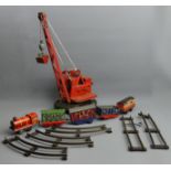 Vintage O guage rolling stock, track and a Jones model mobile crane. UK Postage £16.