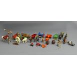 A collection of Britains, Dinky and other die cast animals and vehicles all in played with