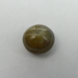 A 7.7 carat round natural cats-eye cabochon stone with Lab certificate. UK Postage £12.