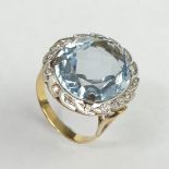 18 carat gold blue and white stone set dress ring, 5.7 grams. Size O, 22 mm wide. UK Postage £12.