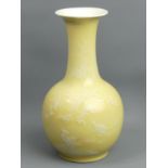 Chinese white slip decorated pale yellow porcelain bottle vase, circa 1950. 23 cm. UK Postage £16.