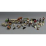 A collection of Britains die cast animals and figures all in played with condition. UK Postage £15.