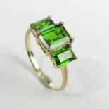 9 carat gold green Tourmaline three stone ring, 2.5 grams. Size R, 8.7 mm wide. UK Postage £12.