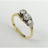 18 carat gold three stone diamond trilogy ring, 2.5 grams.Size K. UK Postage £12.