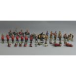 A Winston Churchill die cast figure along with various Military and Cowboy figures, probably made by