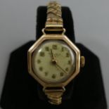 9 carat gold ladies wristwatch circa 1963, 22 mm wide. UK Postage £12.