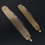 Two 9 carat gold penknives, Birmingham 1976 and 1965. 70 & 55 mm long when closed. UK Postage £12.