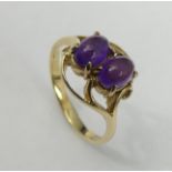 9 carat gold Amethyst two stone ring, 2.5 grams, Sheffield 1994. Size K 1/2, 11 mm wide. UK