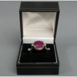 Sterling silver 10 carat ruby dress ring, size O 1/2, top 14 mm, 1.7 mm band. 5 grams. UK Postage £