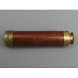 An early 20th century mahogany and brass three drawer telescope by Tagliabue Torre & co London. 13.5
