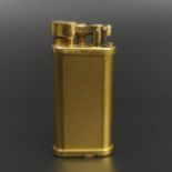 Dunhill gold plated table lighter. 65 mm high. UK Postage £12.