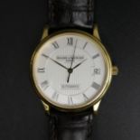 18 carat gold Baume and Mercier automatic, date adjust, visible movement watch. 35 mm wide inc.