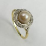 18 carat gold pearl set ring, 3 grams. Size P 1/2, 12.7 mm wide. UK Postage £12.