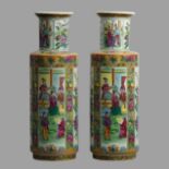 A decorative pair of Chinese famille rose pottery vases. 42 cm. UK Postage £20.