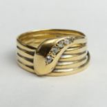 18 carat gold diamond set snake design ring, Birmingham 1919, 9.9 grams. Size Y 1/2, 12.6 mm wide.